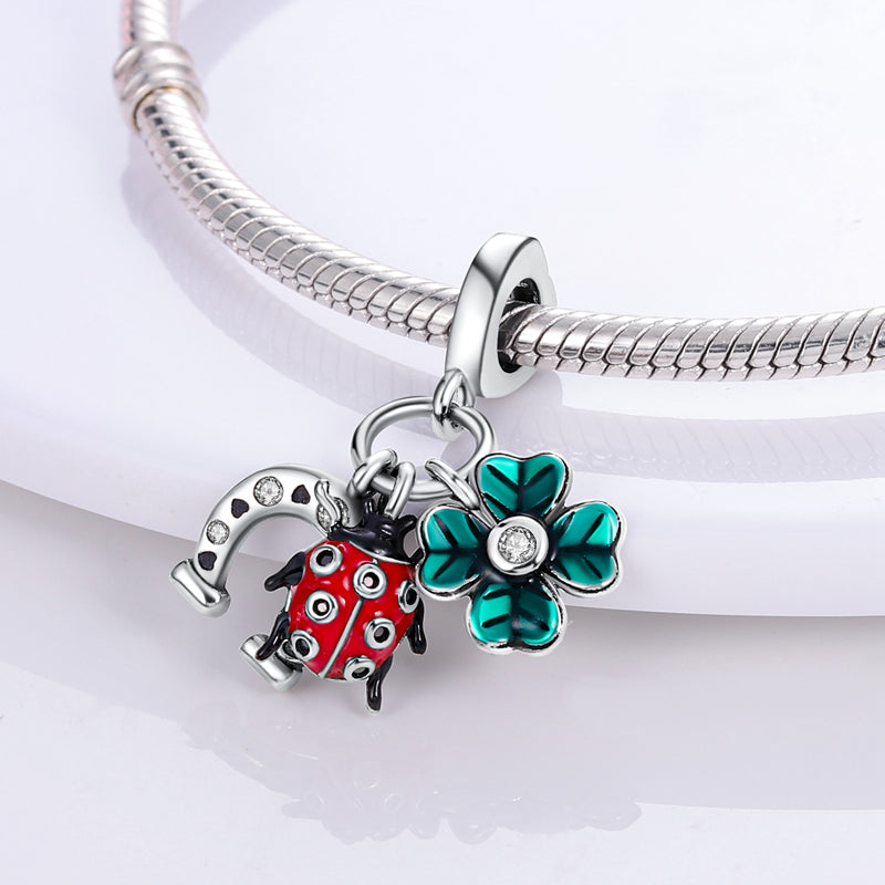 Charm pendentif triple coccinelle, trèfle et fer à cheval en argent - Korell charms