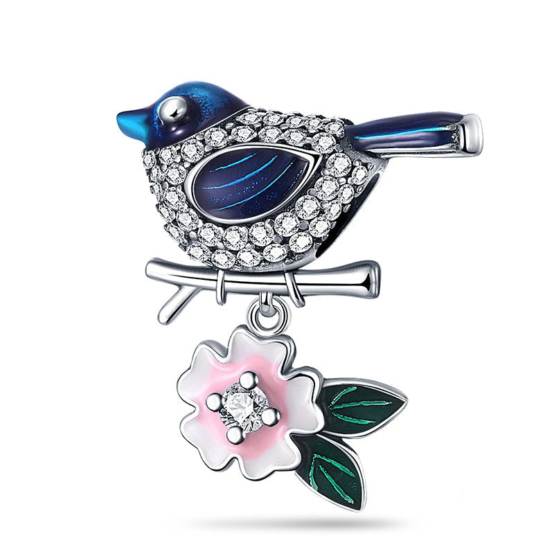 Charm oiseau bleu sur branche et fleur rose en argent - Korell charms