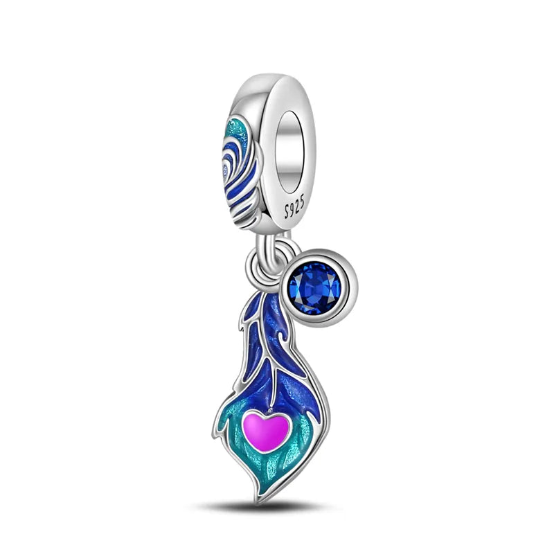 Charm pendentif plume de paon et cristal bleu en argent - Korell charms