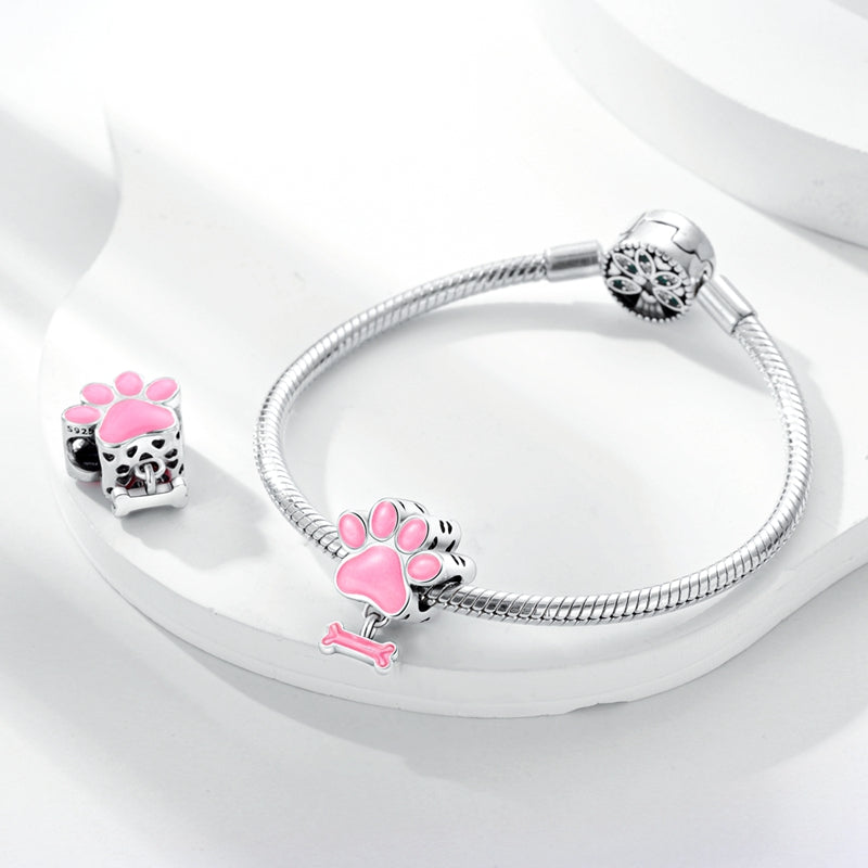 Charm empreinte de patte et os roses en argent - lumineux - Korell charms