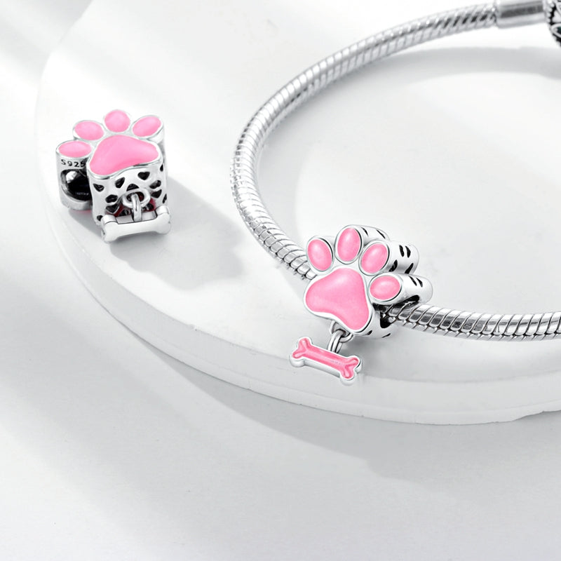 Charm empreinte de patte et os roses en argent - lumineux - Korell charms