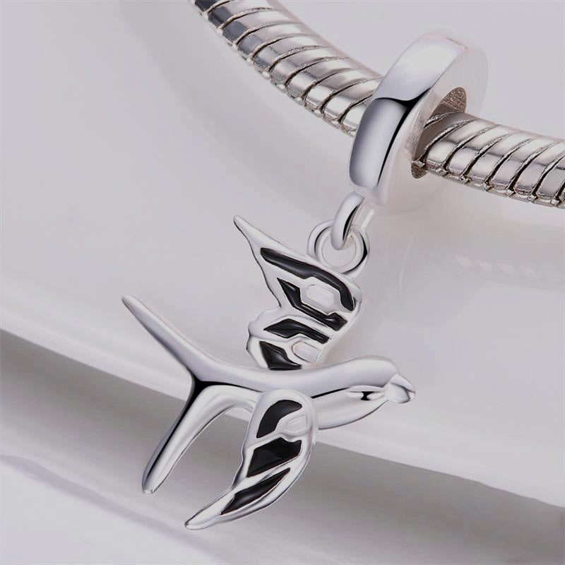 Charm pendentif hirondelle en argent - Korell charms