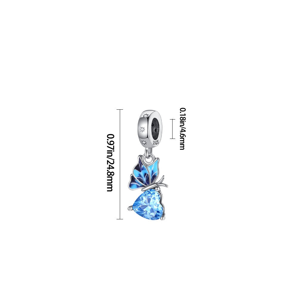 Charm pendentif papillon bleu sur cœur en cristal bleu en argent - Korell charms