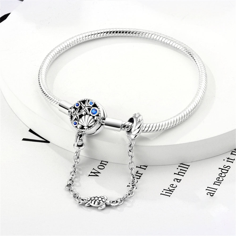 Bracelet pour charms coquillages et étoiles de mer avec chaîne de sécurité intégrée en argent - Korell charms