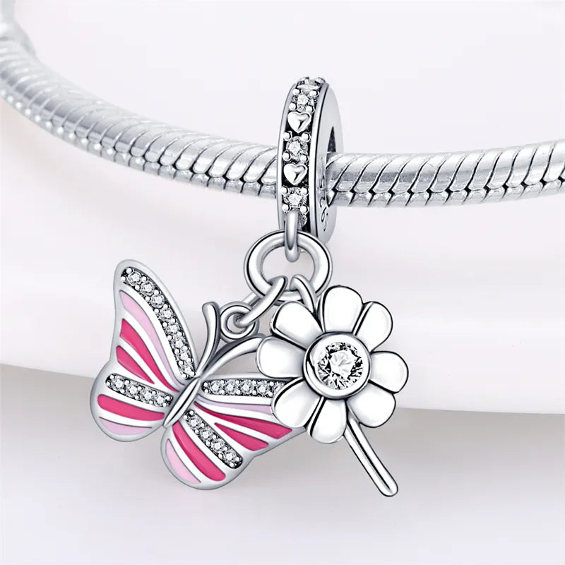 Charm pendentif papillon rose et petite fleur en argent - Korell charms