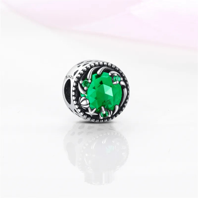 Charm rond cristal vert, coquillage et étoile de mer en argent - Korell charms