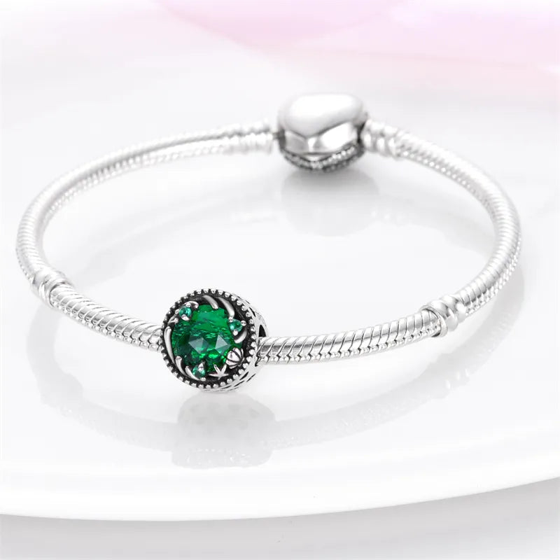 Charm rond cristal vert, coquillage et étoile de mer en argent - Korell charms