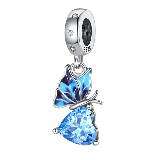 Charm pendentif papillon bleu sur cœur en cristal bleu en argent - Korell charms