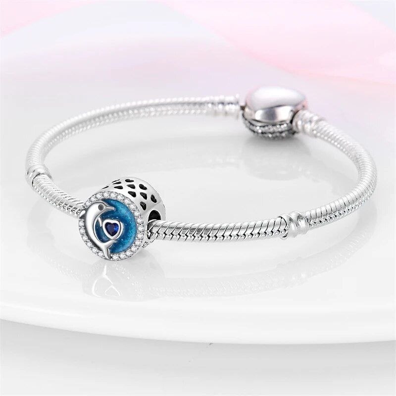 Charm rond dauphin et cœur bleu en argent - Korell charms