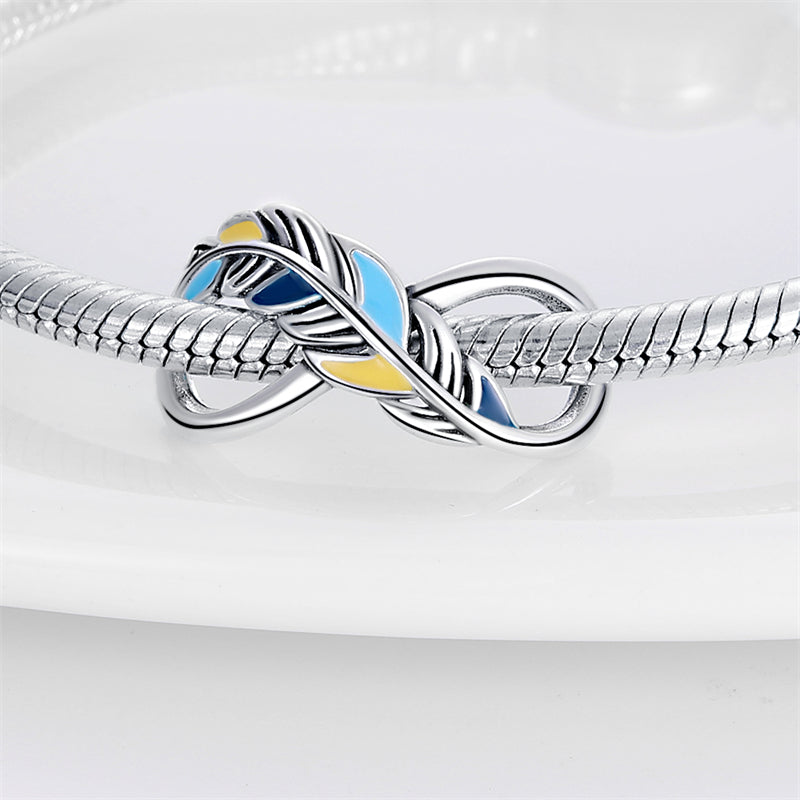 Charm infini plume bleue et jaune en argent - Korell charms