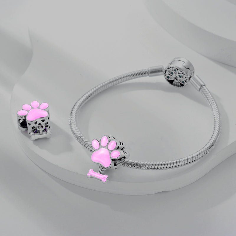 Charm empreinte de patte et os roses en argent - lumineux - Korell charms