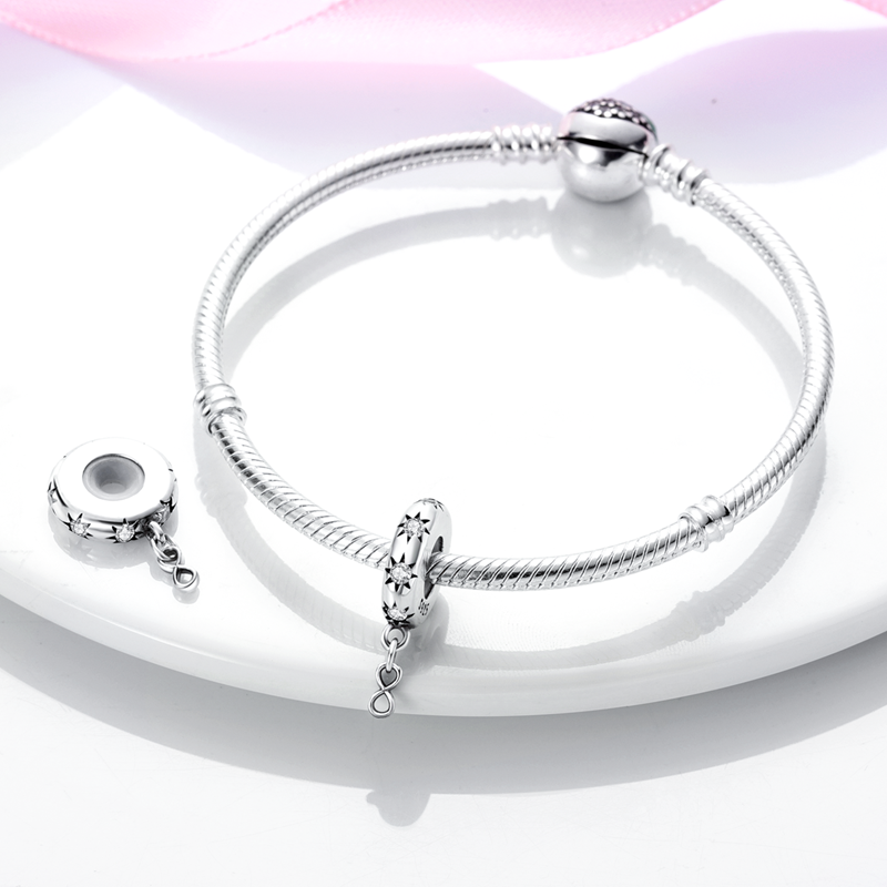 Charm séparateur étoiles en cristaux et signe infini en argent - Korell charms