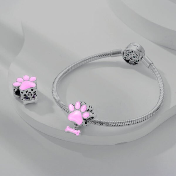 Charm empreinte de patte et os roses en argent - lumineux - Korell charms